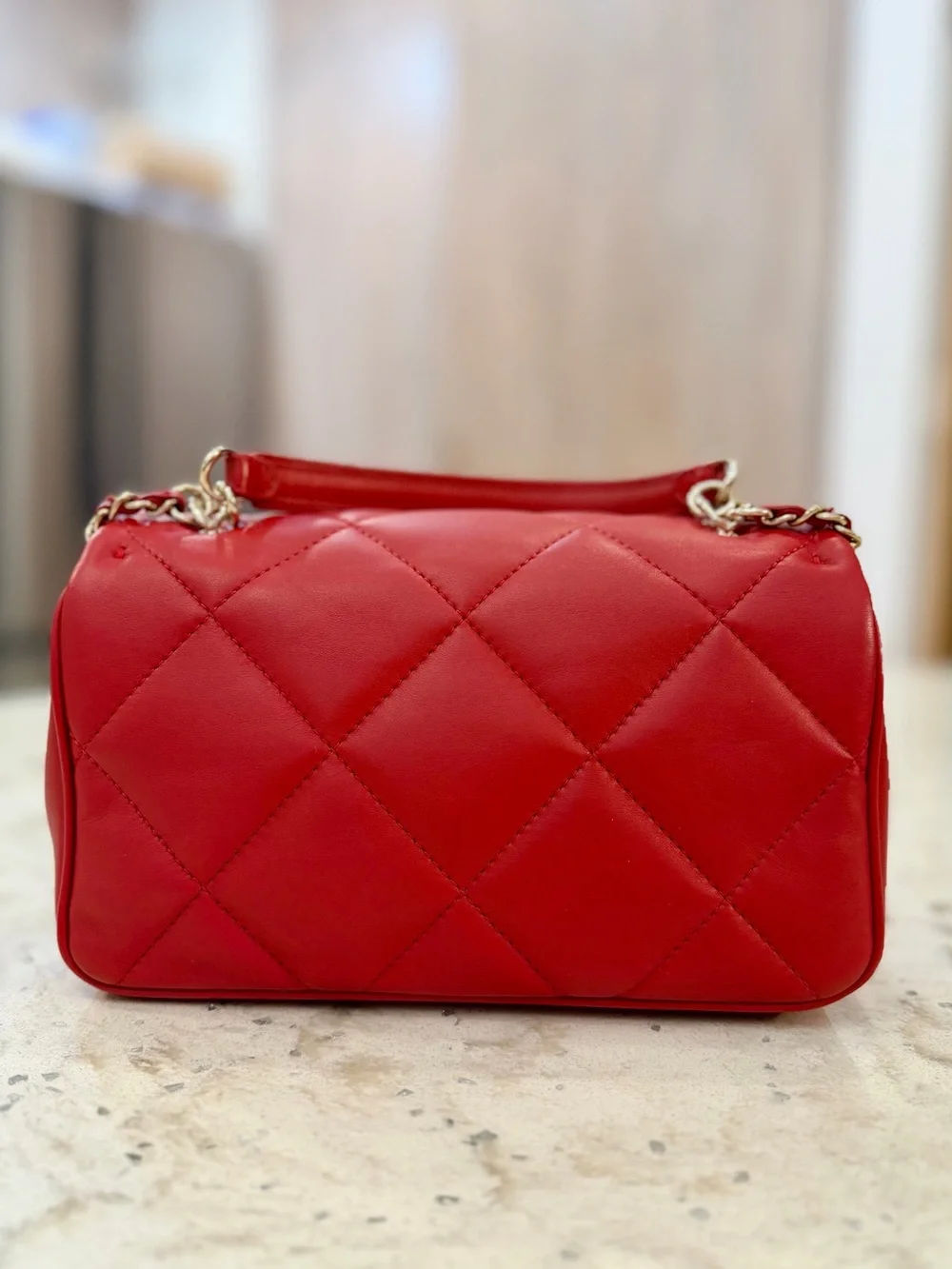 CHANEL Red Quilted Leather Mini Flap Crossbody with Gold Chain